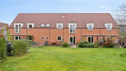 Centralt beliggende andelsbolig med privat have